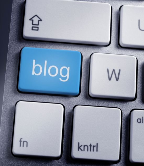 a blue prominent key on keyboard highlighting blog importance