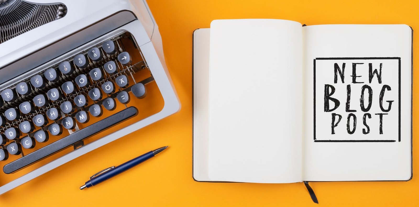 Notebook with "New Blog Post" text beside a typewriter and pen, representing content creation for Guest Posting Services